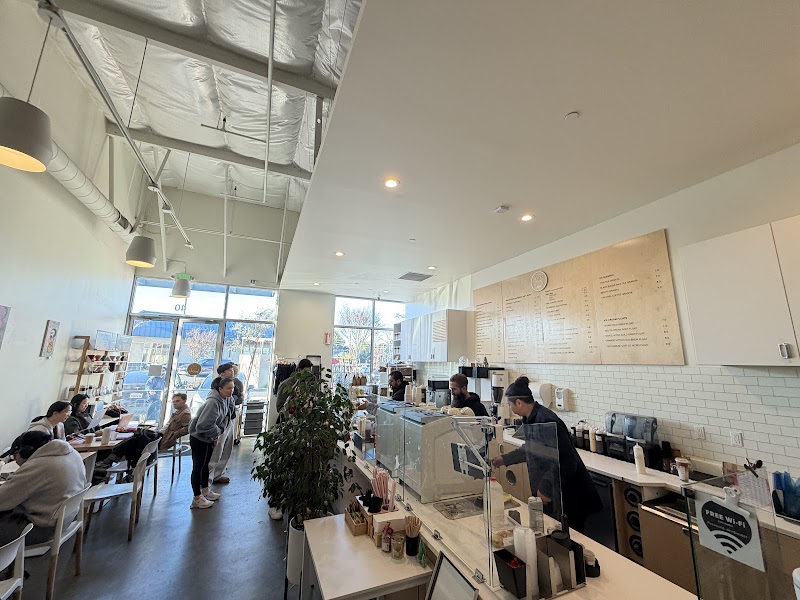 Coffee & Water Lab barista crafting a specialty drink
